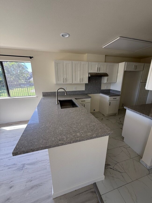 Building Photo - Fully Renovated 4 Bed / 2 Bath Home with 2-Car Garage – $4,500/month