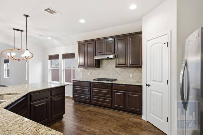 Building Photo - 8336 Paola St