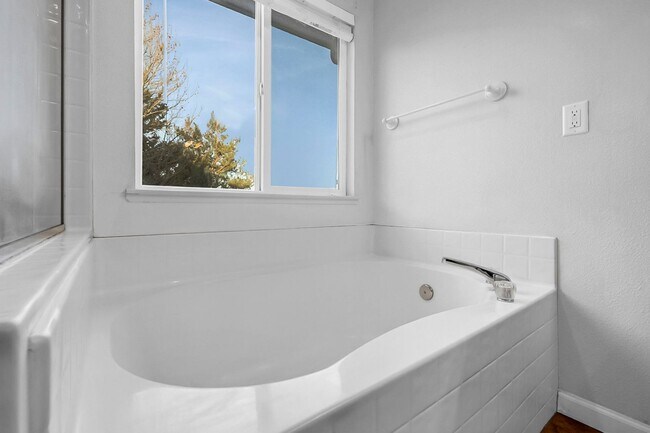 Building Photo - Enjoy this Spectacular Parklike backyard with Landscaping Included in Rent