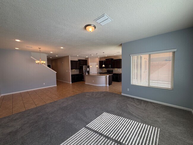Building Photo - 4 Bedroom + Office Home Available Near Loma Colorado Blvd NE & Broadmoor Blvd NE in Rio Rancho!