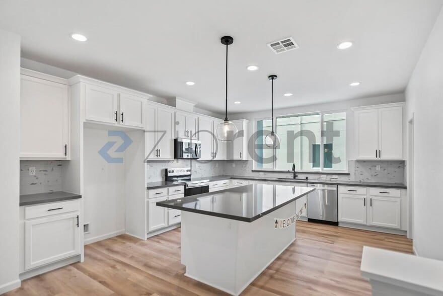 Building Photo - 6165 Raven Ave