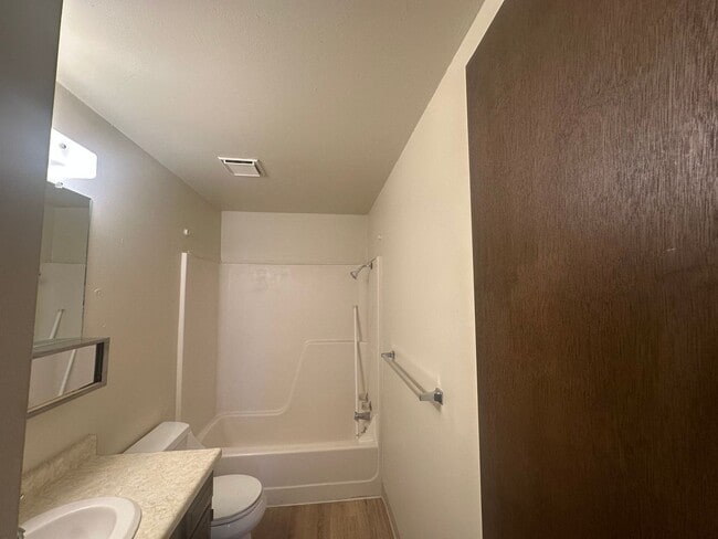 Building Photo - Two Bedroom, One and half bath townhome cl...