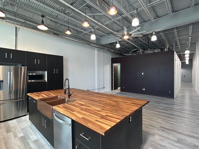 Building Photo - Industrial Style. Downtown Energy. Elevated Living.