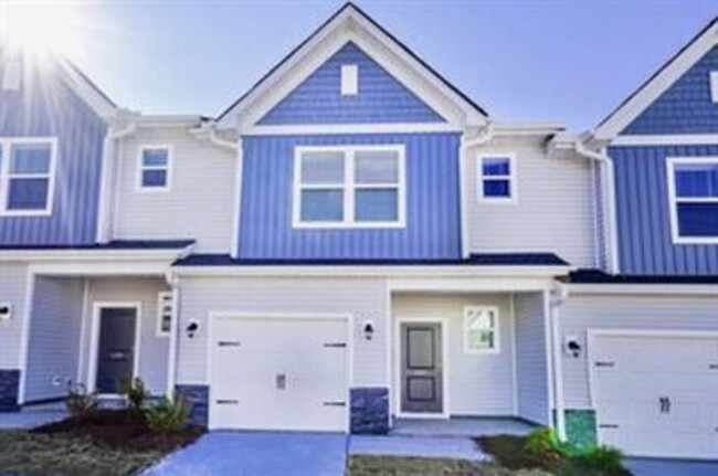 Building Photo - Spacious 3/2.5 Townhome Available February...