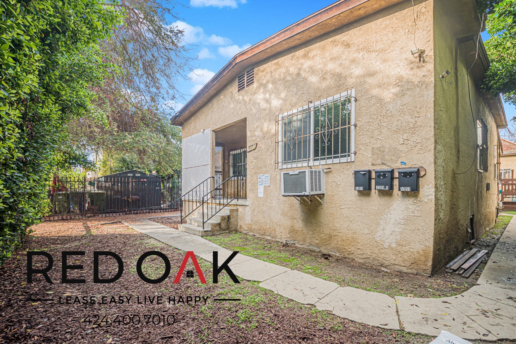 Building Photo - 1309 W 36th Pl