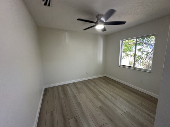 Building Photo - Remodeled 4-bedroom 2 bath 2 car garage in...