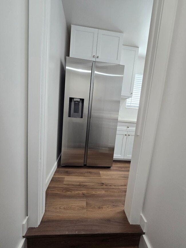 Building Photo - Remodeled 4 Bed, 2 Bath with Double Kitchen & Covered Carport