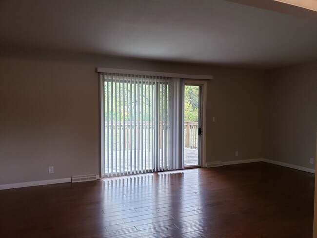 Building Photo - 4 bed / 1 bath 2 car garage home available...
