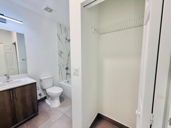 Building Photo - 1295 W 69th St