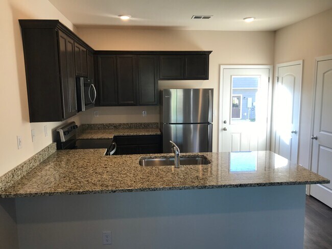 Building Photo - 8079 Logan Dr