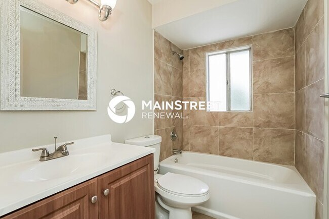 Building Photo - 4 Bedroom Pet-Friendly Home in FORT MYERS, FL with Main Street Renewal