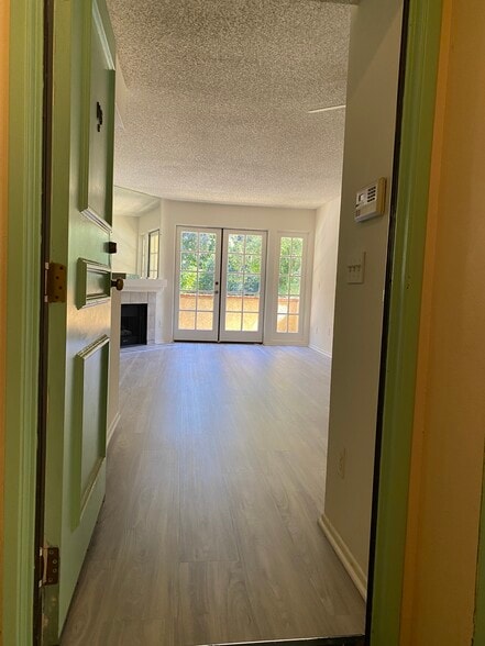 1BR, 2BA - 750 - Living Room - A & J Investments