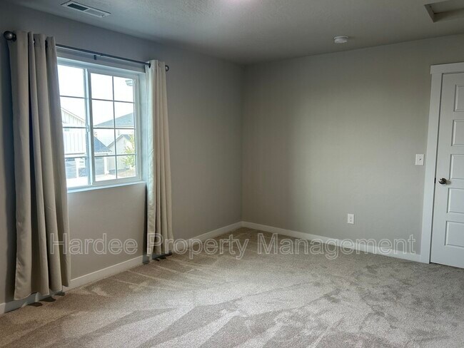 Building Photo - 7051 W Plateau Crk Dr