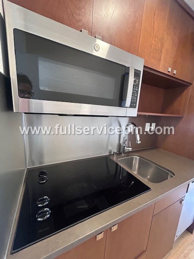 Building Photo - Alki Beach Living! Comfy 1 BD! Puget Sound Views! Super Sunsets!
