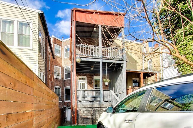 Building Photo - COMING SOON - Sprawling 5 Bed, 3 Bath, Two Kitchens, Dual Back Decks, Two Office/Den Townhouse, 2...