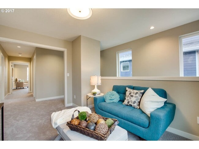 Building Photo - Charming 3BR Home with Fireplace, Bright Open Living Spaces & Loft