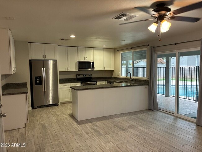 Building Photo - 6713 W Carol Ave