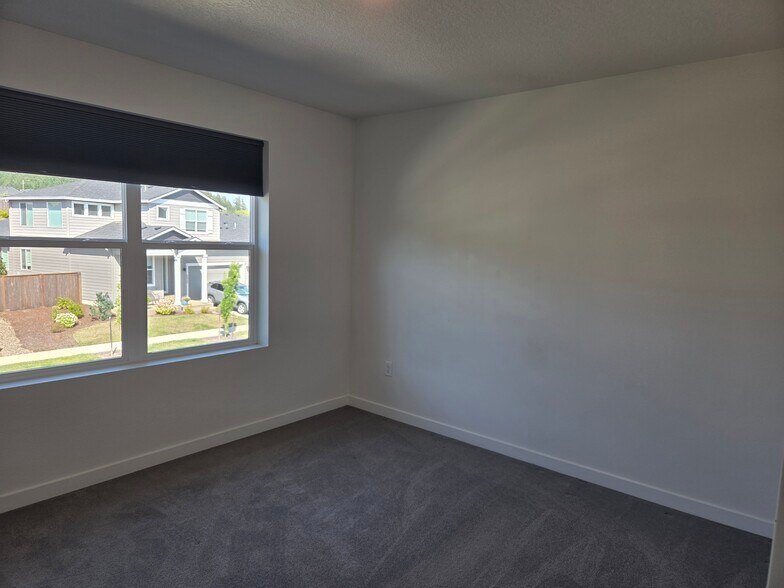 first upstairs bedroom - 5450 NW Stardown Dr