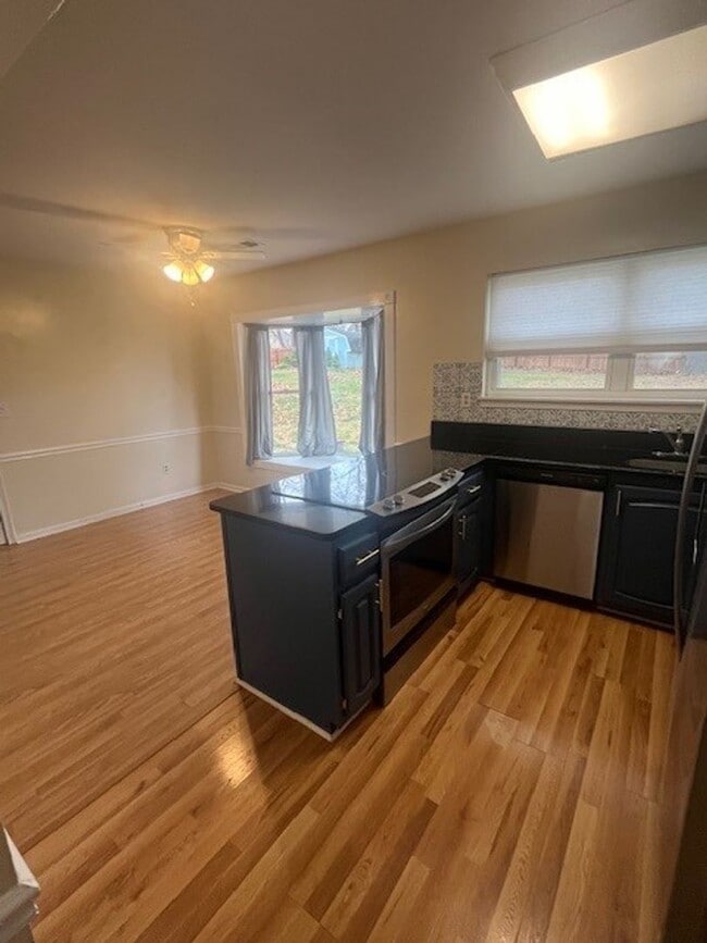 Building Photo - LOVELY CAPE COD WITH 4 BEDS, 2 BATHS AND GARAGE