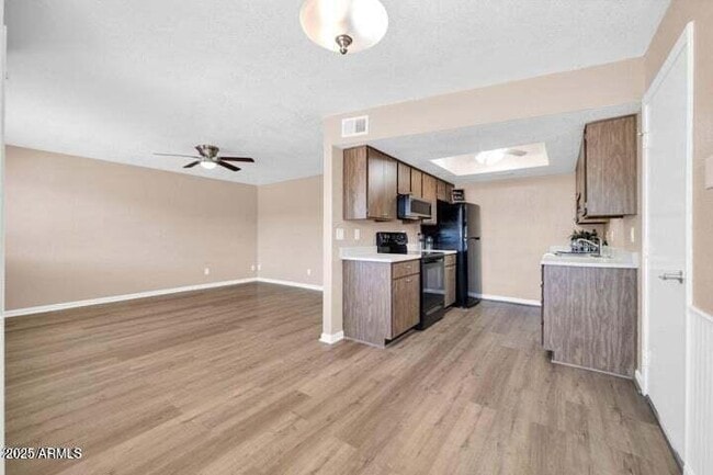 Building Photo - 9639 W Cinnabar Ave