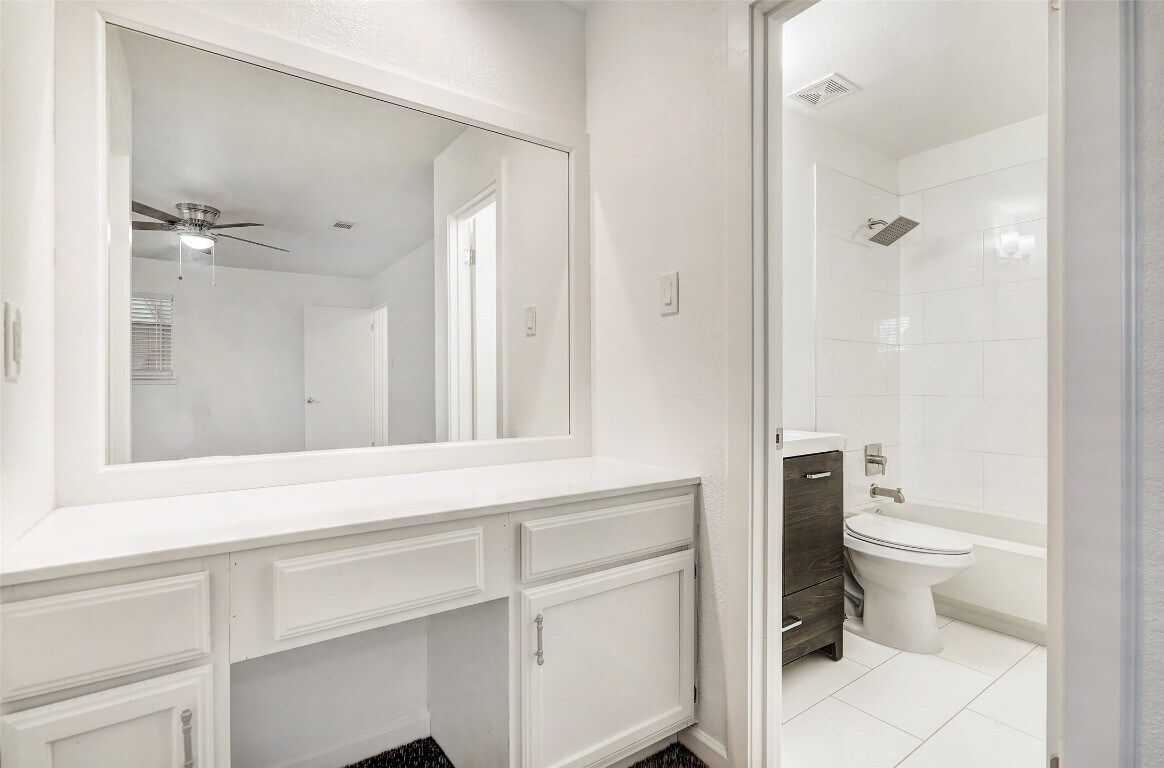 2 of the 3 full bathrooms - 11804 Aloe Vera Trl