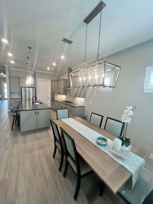 Building Photo - STUNNING LAKEFRONT 3 BEDROOM, 2.5 BATH HOM...