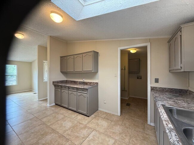 Building Photo - 6575 N Pelto Path