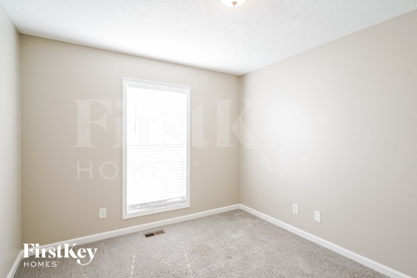 Building Photo - 6009 Pleasant Hill Dr