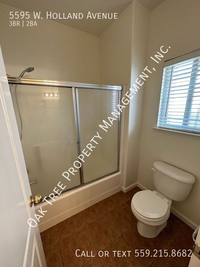 Building Photo - 5595 W Holland Ave