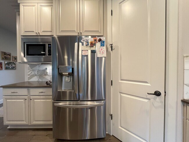 Building Photo - Spacious Corner-Lot Home with Three Levels...