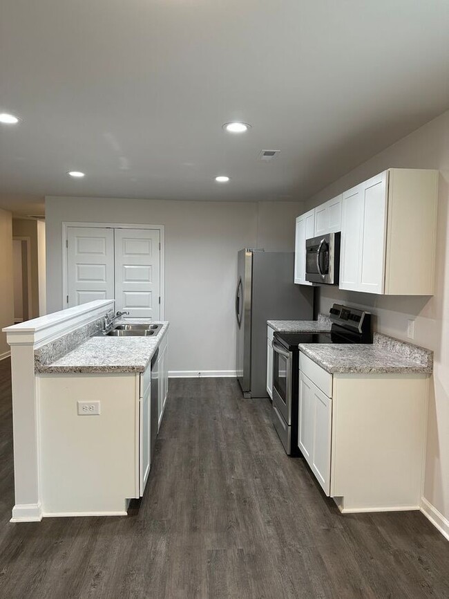 Building Photo - Available Now! Spacious 4-Bedroom, 2-Bath Home in Kilpatrick Landing
