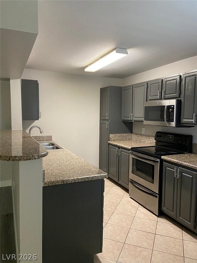 Building Photo - 5055 W Hacienda Ave