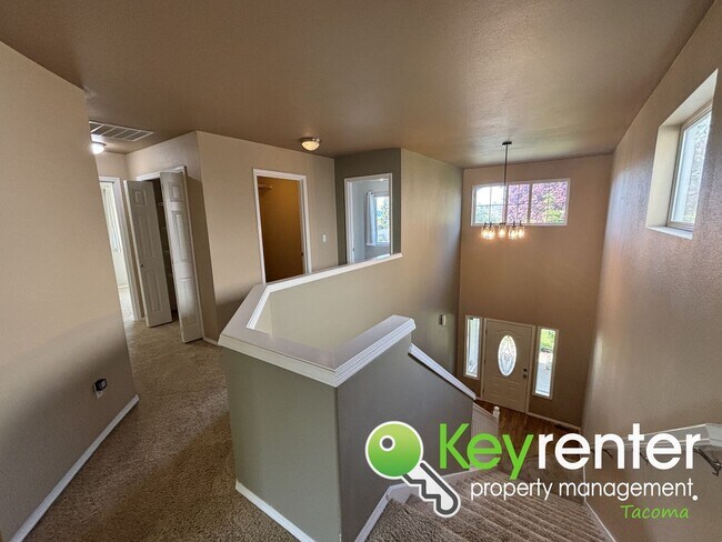 Building Photo - Elegant Browns Point Living with Backyard ...