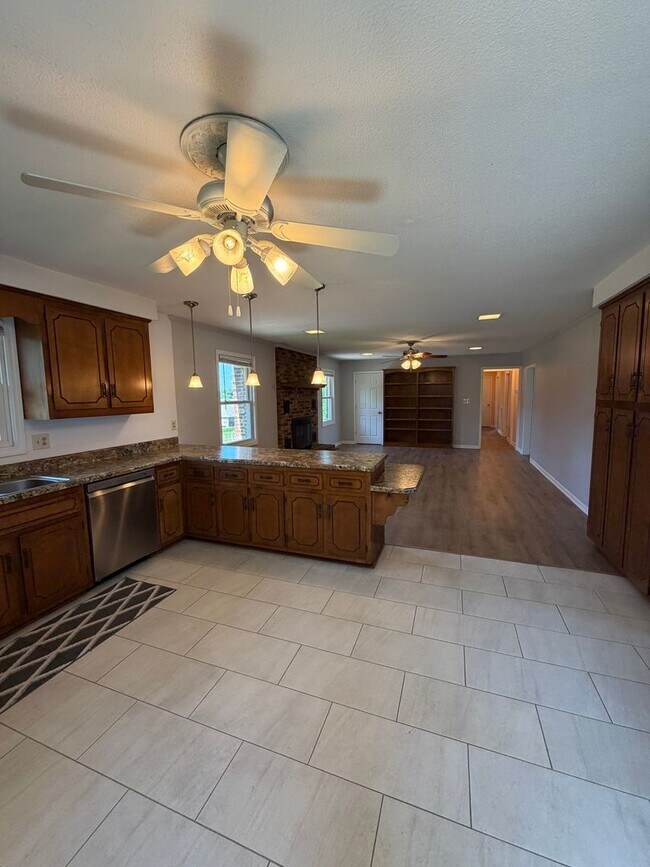 Building Photo - Situated in the heart of Sango, massive lot, and includes a fully finished & recently remodeled b...