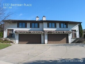 Building Photo - Large well kept duplex rental home on Madi...