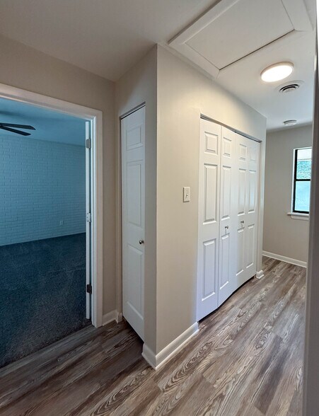 Upstairs hallway with laundry - 8300 Scottingham Dr