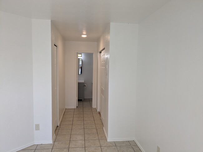 Hallway to master bath - 232 W Roger Rd