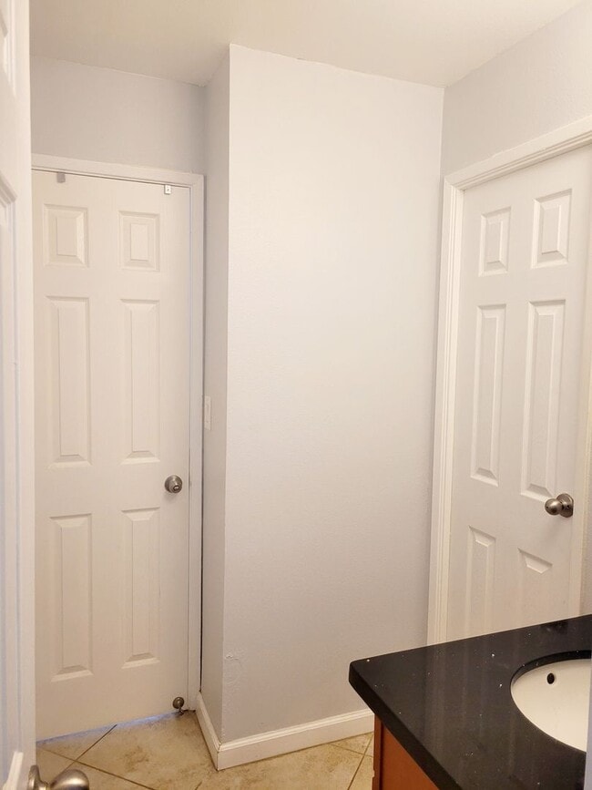 Building Photo - AVAILABLE | 2 Bedroom, 1 Bathroom Condo with 1 Assigned Parking Stall