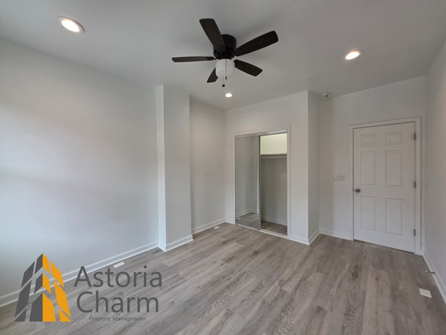 Building Photo - 3 Bedroom End Unit with Finished Basement and Fenced Yard on E 28th Street