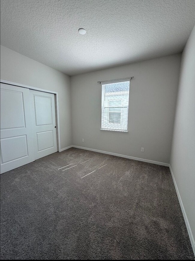 Building Photo - Water Front Home- 4 Large Bedrooms-3 baths Gated Community Call Sheila Campbell 407-687-7900