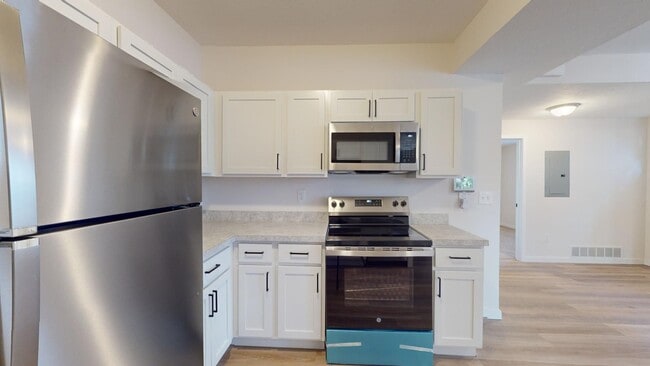 Building Photo - IMMACULATE - Clark / Fulton Area - 3 Bedrooms - 3 Baths - Single Family Home