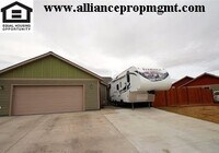 Building Photo - Centrally-located 3 bedroom home with paved RV parking.