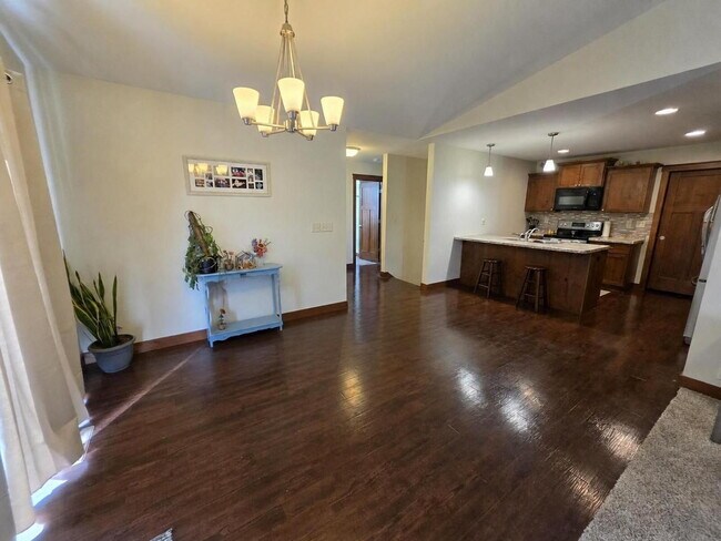 Building Photo - FREE SEPTEMBER RENT for this Spacious 4-Bedroom Home with Vaulted Ceilings with Finished Basement...