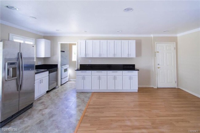 Building Photo - 4 br, 4 bath House - 6936 Encino Ave