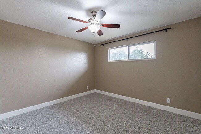 Building Photo - 1320 E Orchid Ln