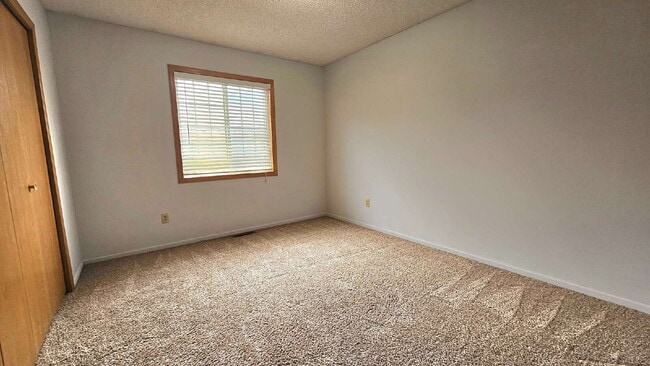 Building Photo - Charming 2-Bed Townhouse Retreat on Harriet Ave  available now.