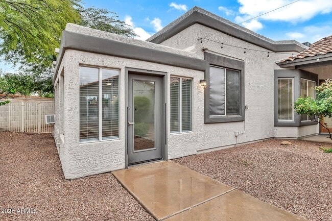 Building Photo - 9379 E Windrose Dr