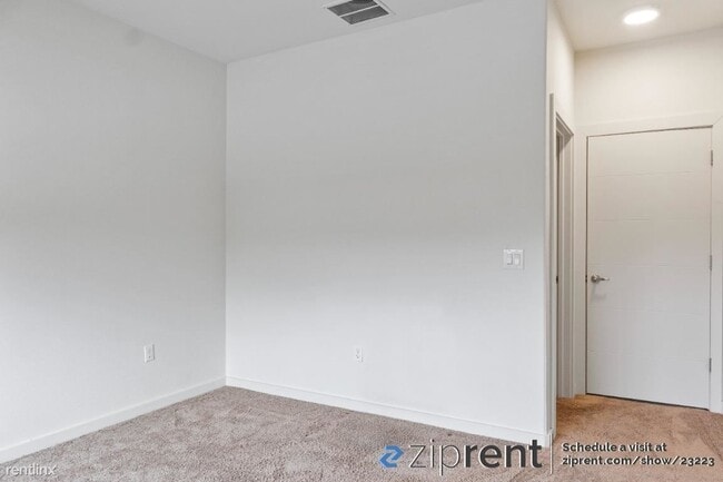 Building Photo - 2 br, 2.5 bath Townhome - 7805 Cooper Lane...