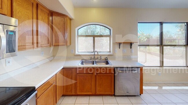 Building Photo - 9953 E Onza Ave