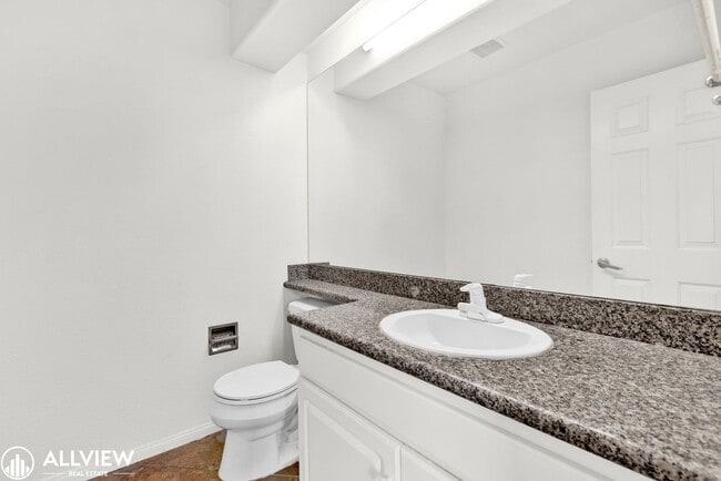 Building Photo - Spacious Coastal Condo with Rooftop Ocean ...